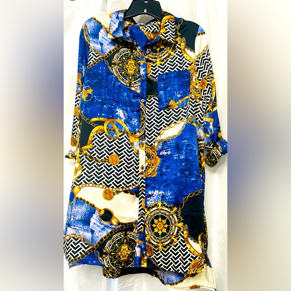 Women’s multi color shirt. Never been worn. Medium